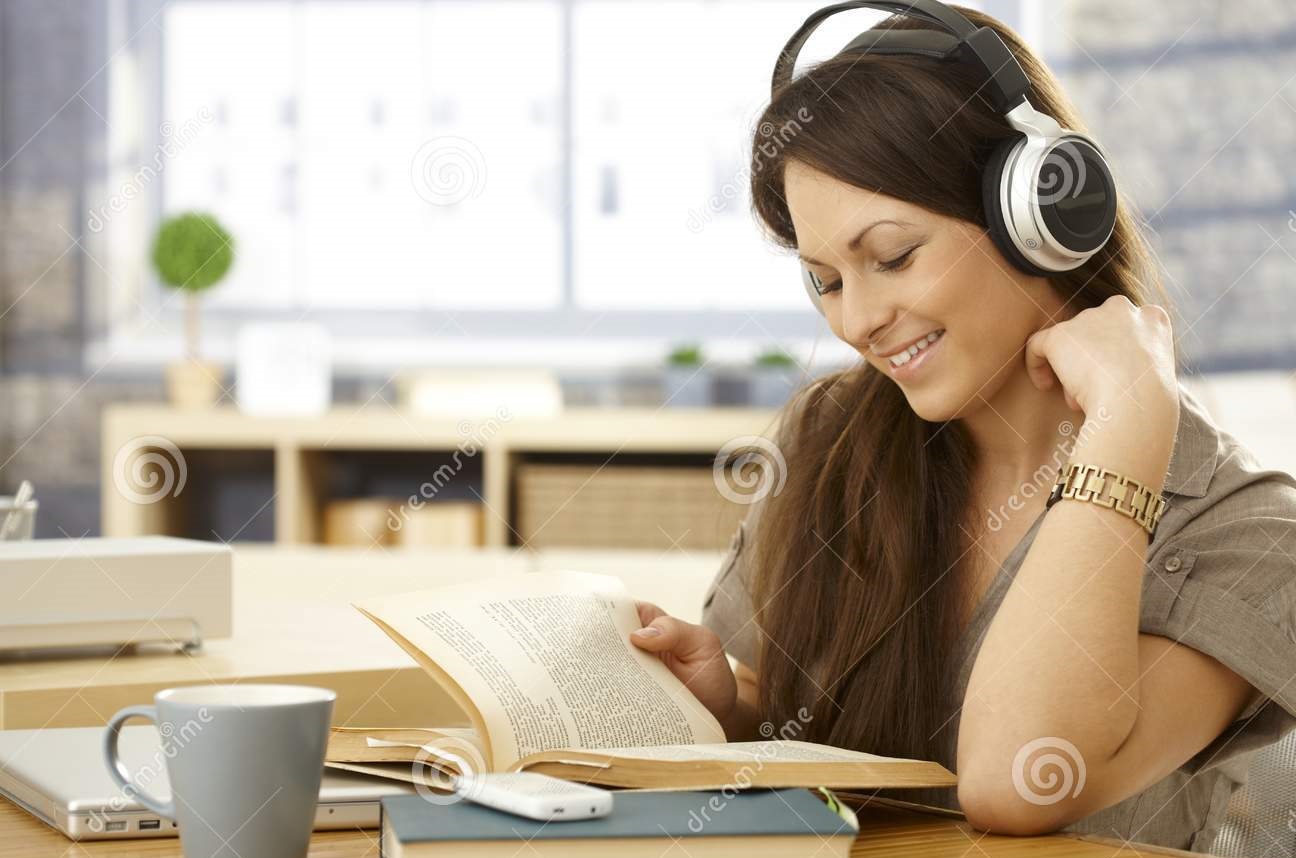happy-woman-book-headphones-young-reading-using-smiling-33413846.jpg