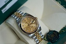 Rolex demi yellow gold new.jpg